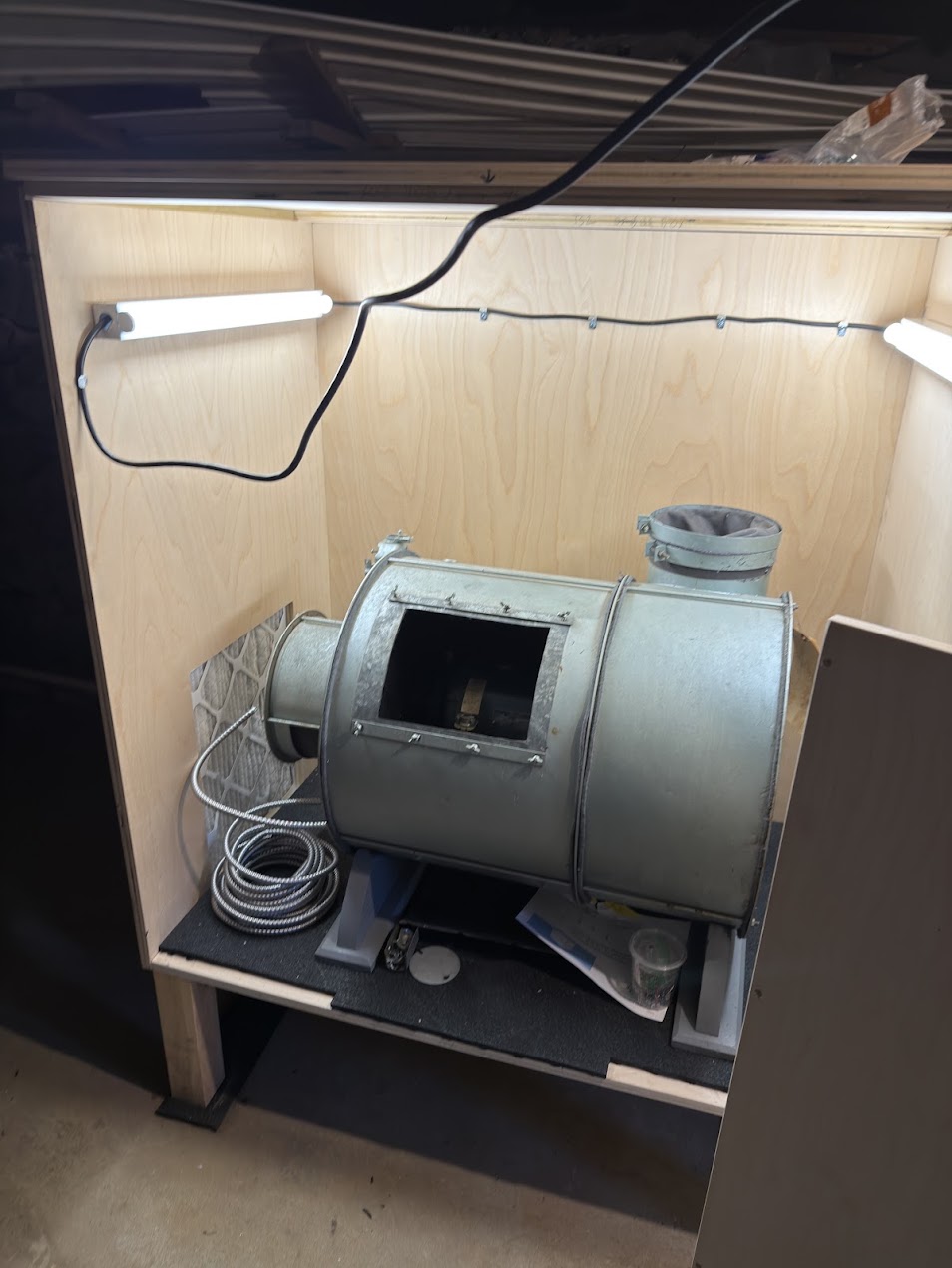 Blower box during assembly with blower installed